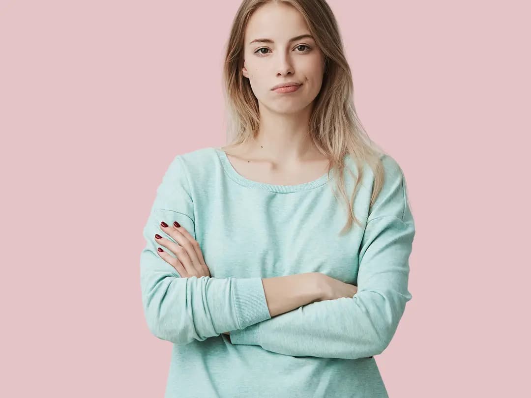 A woman with her arms crossed